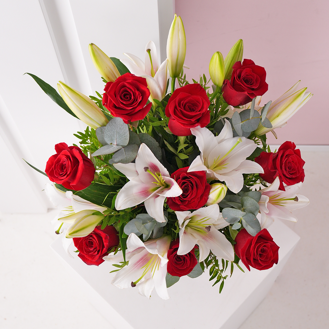 
              Sympathy Red Roses and Pink Lilies