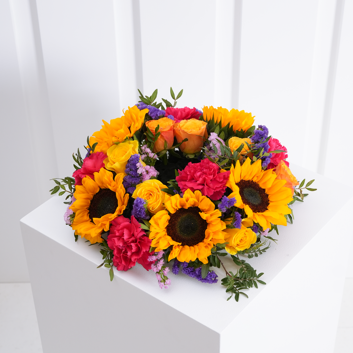 
              Vibrant Funeral Wreath