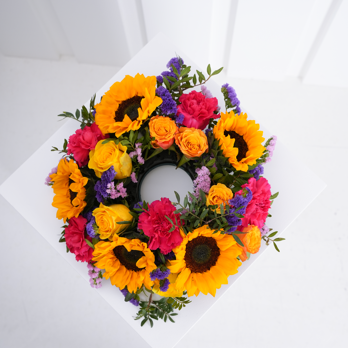 
              Vibrant Funeral Wreath
